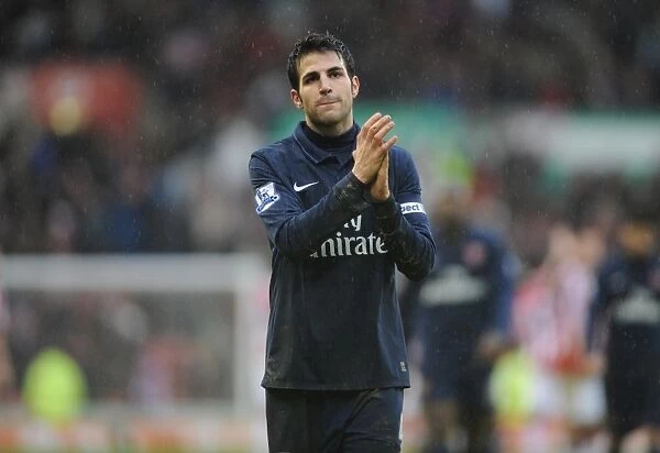 Arsenal captain Cesc Fabregas claps the fans after the match. Stoke City 3: 1 Arsenal