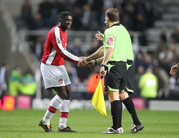 Arsenal captain Kolo Toure shakes hands with officials