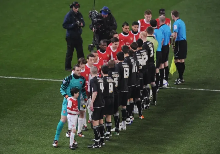 Framed Print : Arsenal captain Manuel Almunia leads out the team. Arsenal 5: 0 Leyton Orient Framed Print : Arsenal captain Manuel Almunia leads out the team. Arsenal 5: 0 Leyton Orient