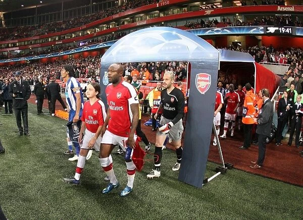 Arsenal captain William Gallas leads the team out