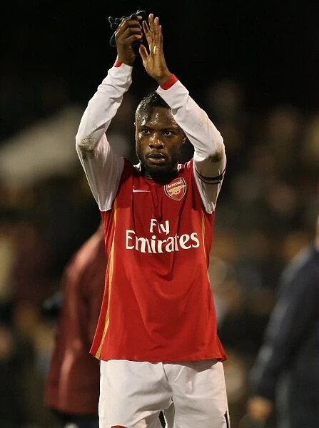 Arsenal captain William Gallas waves to the fans after the match