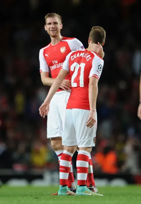 Framed Print : Arsenal Celebrate: Mertesacker and Chambers Reunite after Arsenal's Victory over Galatasaray (2014 / 15 Champions League) Framed Print : Arsenal Celebrate: Mertesacker and Chambers Reunite after Arsenal's Victory over Galatasaray (2014 / 15 Champions League)