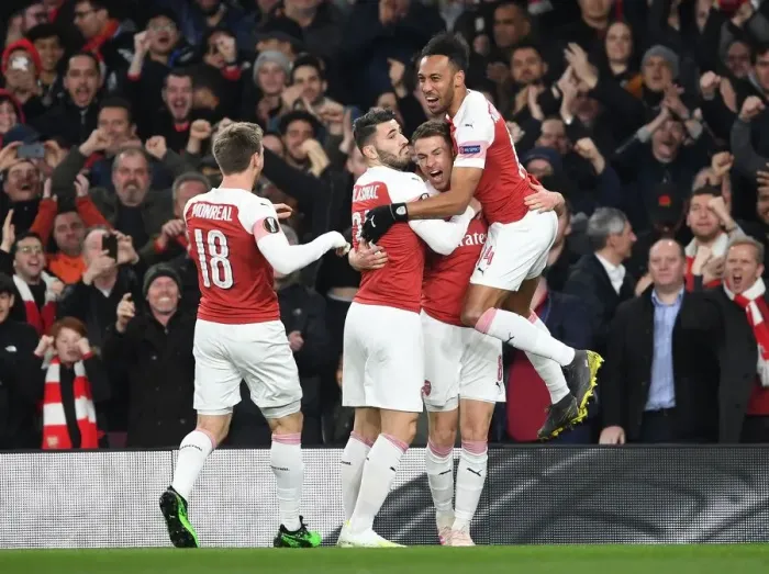 Framed Print : Arsenal Celebrate Aaron Ramsey's Goal vs S.S.C. Napoli in Europa League Quarterfinal