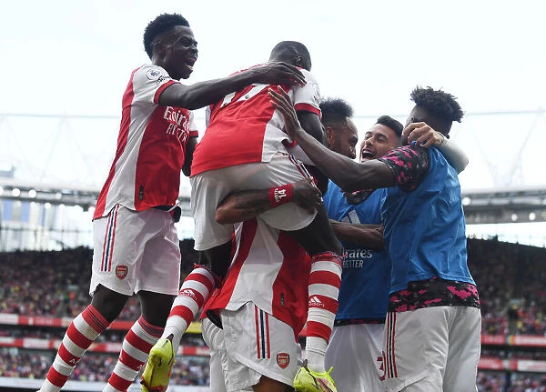 Arsenal Celebrate: Aubameyang Scores Against Norwich City (2021-22)