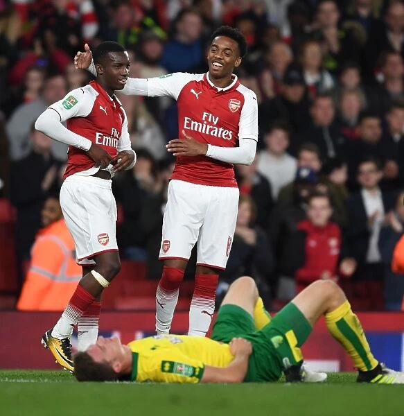 Arsenal Celebrate Carabao Cup Victory: Eddie Nketiah and Joe Willock Reunite after Norwich City Win