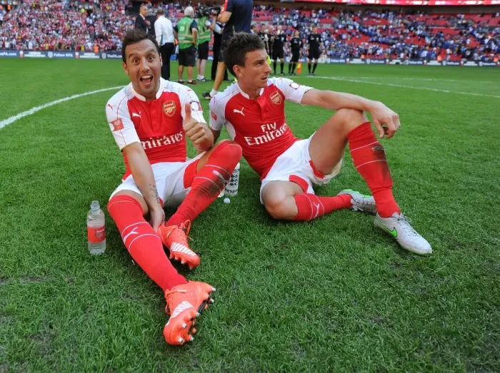 Framed Print : Arsenal Celebrate Community Shield Victory over Chelsea (2015): Santi Cazorla and Laurent Koscielny Rejoice Framed Print : Arsenal Celebrate Community Shield Victory over Chelsea (2015): Santi Cazorla and Laurent Koscielny Rejoice