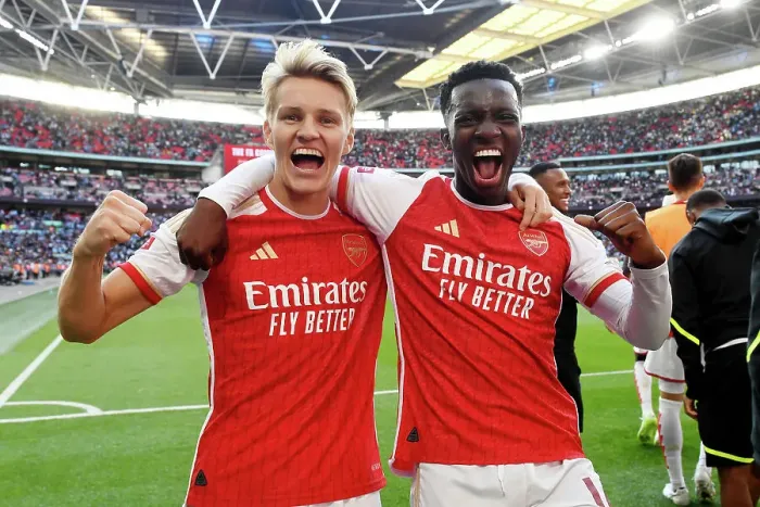 Framed Print : Arsenal Celebrate Community Shield Victory over Manchester City (2023-24): Martin Odegaard and Edward Nketiah Rejoice in Glory Framed Print : Arsenal Celebrate Community Shield Victory over Manchester City (2023-24): Martin Odegaard and Edward Nketiah Rejoice in Glory