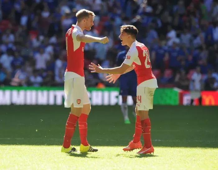 Framed Print : Arsenal Celebrate Community Shield Victory: Mertesacker and Bellerin Embrace in Triumph over Chelsea Framed Print : Arsenal Celebrate Community Shield Victory: Mertesacker and Bellerin Embrace in Triumph over Chelsea