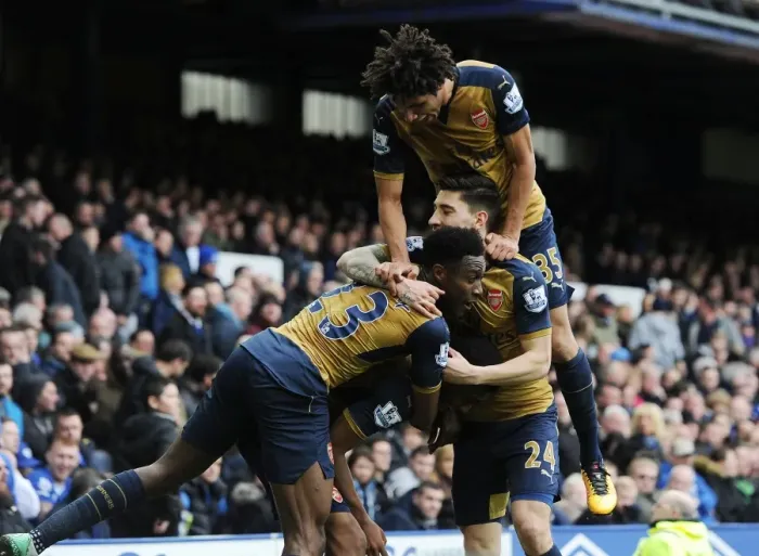 Framed Print : Arsenal Celebrate Double Strike: Iwobi, Welbeck, Bellerin, and Elneny Rejoice After Goals vs. Everton (2015-16)