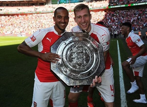 Arsenal Celebrate FA Community Shield Victory over Chelsea (2015-16): Theo Walcott and Per Mertesacker Rejoice