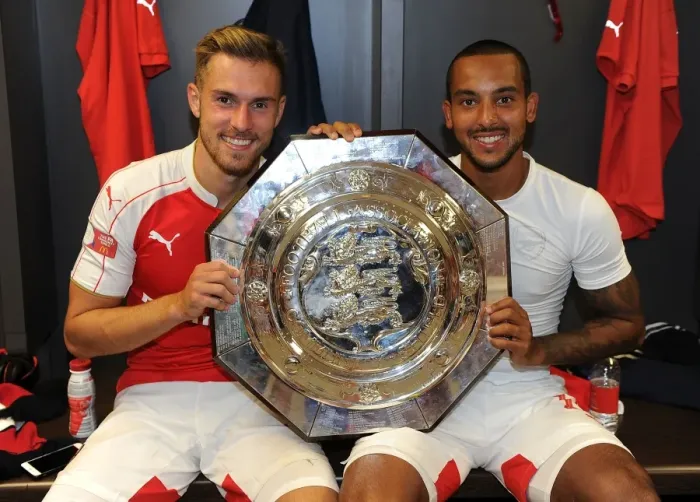 Framed Print : Arsenal Celebrate FA Community Shield Victory over Chelsea (2015): Theo Walcott and Aaron Ramsey's Triumphant Moment