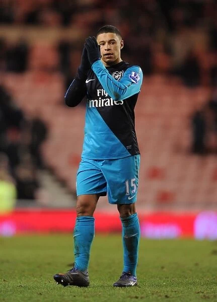 Arsenal Celebrate FA Cup Fifth Round Victory Over Sunderland: Alex Oxlade-Chamberlain Applauds Fans