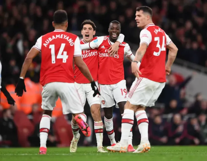 Framed Print : Arsenal Celebrate First Goal Against Newcastle United in Premier League Showdown Framed Print : Arsenal Celebrate First Goal Against Newcastle United in Premier League Showdown