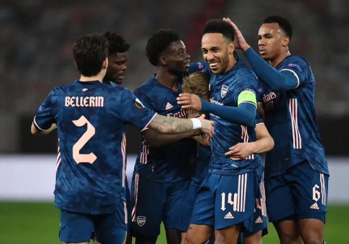 Framed Print : Arsenal Celebrate First Goal Against Olympiacos in Empty Karaiskakis Stadium, UEFA Europa League Round of 16