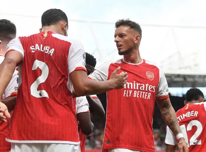 Framed Print : Arsenal Celebrate First Goal: Saliba, White, and Nketiah vs. Nottingham Forest (2023-24)