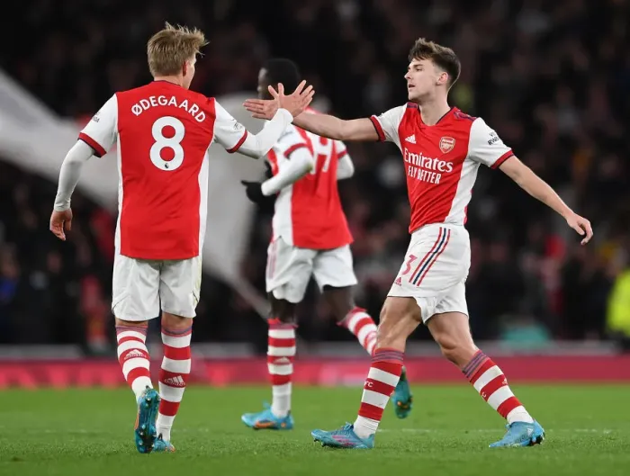 Framed Print : Arsenal Celebrate First Goal: Tierney and Odegaard Rejoice vs. Wolverhampton Wanderers (2021-22) Framed Print : Arsenal Celebrate First Goal: Tierney and Odegaard Rejoice vs. Wolverhampton Wanderers (2021-22)
