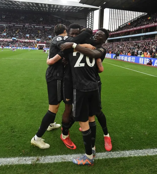 Framed Print : Arsenal Celebrate Own Goal by Aston Villa's Emi Martinez in Premier League Clash Framed Print : Arsenal Celebrate Own Goal by Aston Villa's Emi Martinez in Premier League Clash