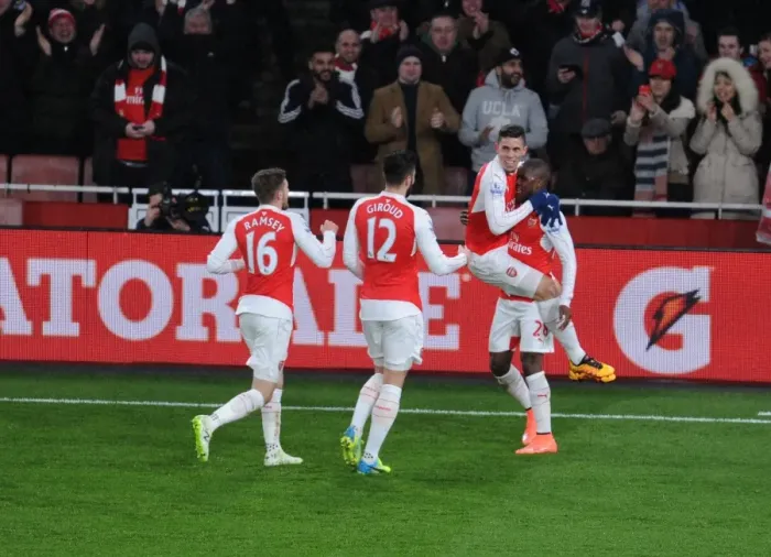 Framed Print : Arsenal Celebrate Goal: Campbell, Ramsey, Giroud, and Gabriel (2015-16)