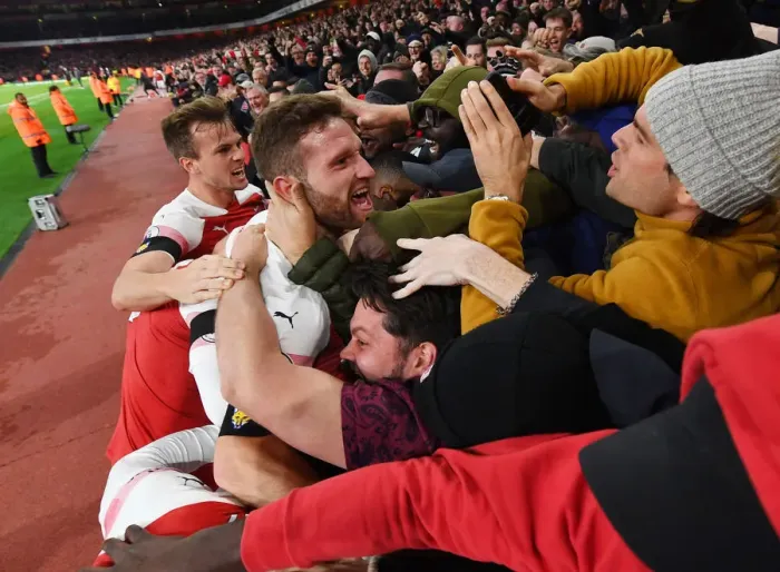 Framed Print : Arsenal Celebrate Goal Against Liverpool: Holding, Mustafi, and Ecstatic Fans Framed Print : Arsenal Celebrate Goal Against Liverpool: Holding, Mustafi, and Ecstatic Fans