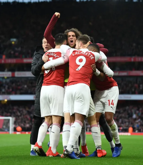 Framed Print : Arsenal Celebrate Third Goal Against Tottenham in Premier League Clash Framed Print : Arsenal Celebrate Third Goal Against Tottenham in Premier League Clash