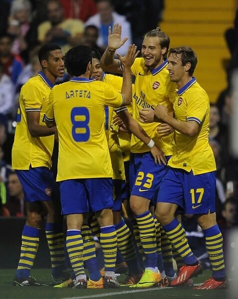 Arsenal Celebrate Goal Against West Bromwich Albion in Capital One Cup (2013-14)