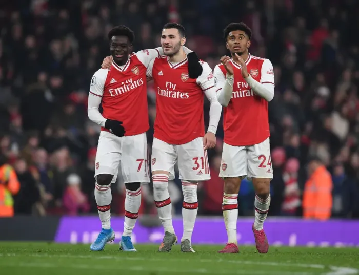 Framed Print : Arsenal Celebrate Hard-Fought Victory Over Manchester United in Premier League Showdown