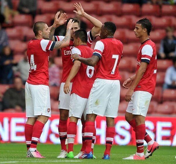 Arsenal Celebrate Henri Lansbury's Goal Against Anderlecht in 2012 Pre-Season