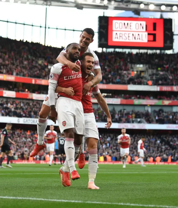 Framed Print : Arsenal Celebrate: Lacazette, Xhaka, Ramsey Score in Arsenal v Everton (2018-19)