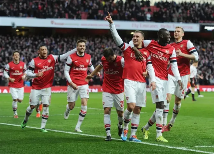Framed Print : Arsenal Celebrate with Lukas Podolski and Yaya Sanogo: FA Cup Fifth Round vs Liverpool (2013-14) Framed Print : Arsenal Celebrate with Lukas Podolski and Yaya Sanogo: FA Cup Fifth Round vs Liverpool (2013-14)