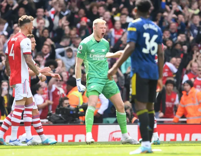 Framed Print : Arsenal Celebrate Manchester United Penalty Miss: Ramsdale's Heroic Moment in Arsenal vs. Manchester United (2021-22)