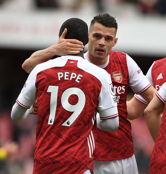 Arsenal Celebrate with Nicolas Pepe and Granit Xhaka: Arsenal v Brighton & Hove Albion, Premier League 2021