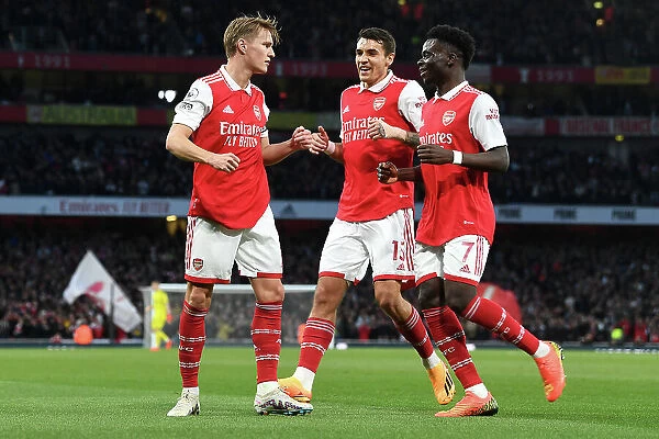Arsenal Celebrate as Odegaard Scores First Goal Against Chelsea in 2022-23 Premier League Clash