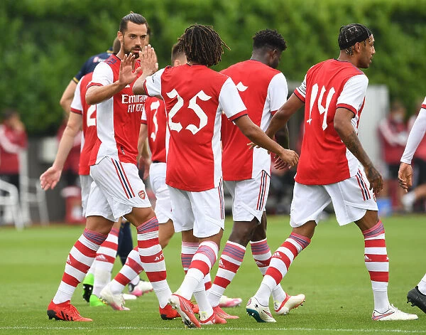 Arsenal Celebrate: Pablo Mari and Mohamed Elneny High-Five After Goal vs. Millwall (2021-22)