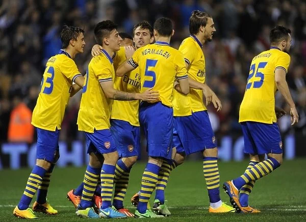 Arsenal Celebrate Penalty Shootout Victory Over West Bromwich Albion in Capital One Cup