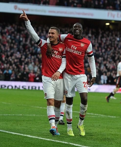 Arsenal Celebrate: Podolski and Sanogo Score in FA Cup Fifth Round Against Liverpool