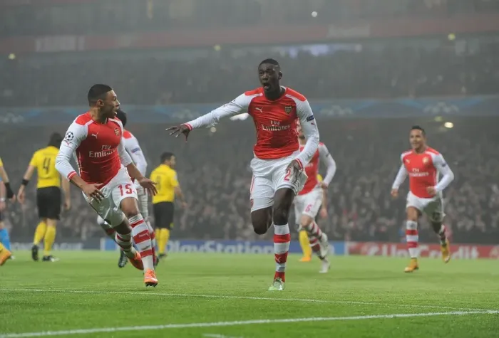 Framed Print : Arsenal Celebrate: Sanogo Scores Against Borussia Dortmund in 2014-15 Champions League