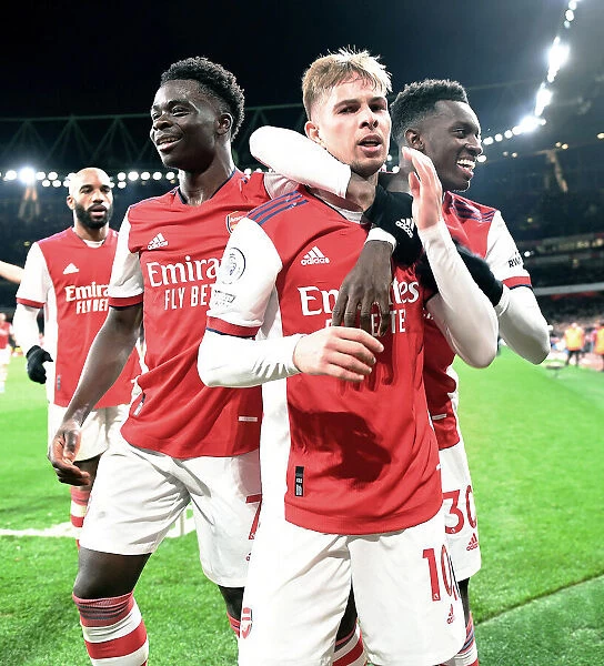 Arsenal Celebrate: Smith Rowe, Saka, and Nketiah Score Against West Ham in Premier League