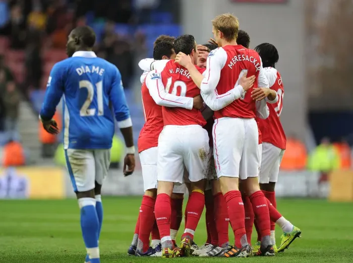 Framed Print : Arsenal Celebrate Vermaelen's Goal: Wigan Athletic vs Arsenal, Premier League 2011-12