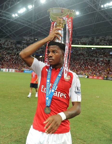 Arsenal Celebrate Victory: Chuba Akpom Lifts Barclays Asia Trophy After Arsenal's Win Against Everton, Singapore 2015