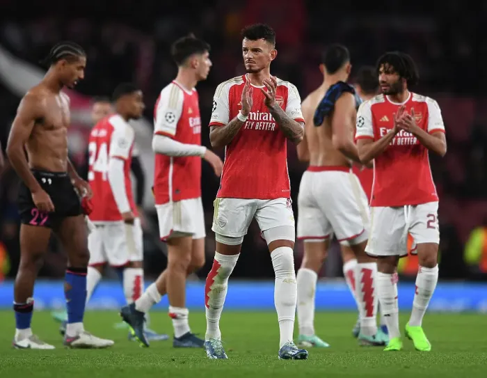 Framed Print : Arsenal Celebrate Victory Over Sevilla in Champions League Group Stage