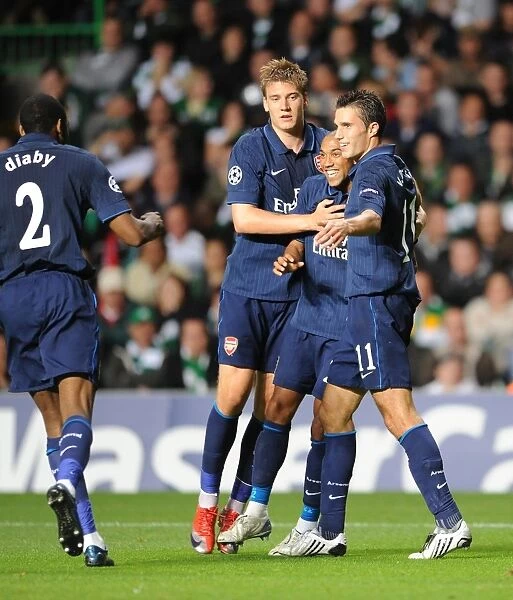 Arsenal Celebrates Double Strike: Diaby, Bendtner, Clichy, and van Persie Rejoice after 2-0 Goals vs. Celtic, UEFA Champions League Play-off Round 1st Leg, 2009