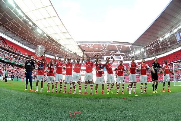 Arsenal Celebrates FA Community Shield Win Against Manchester City (2014)