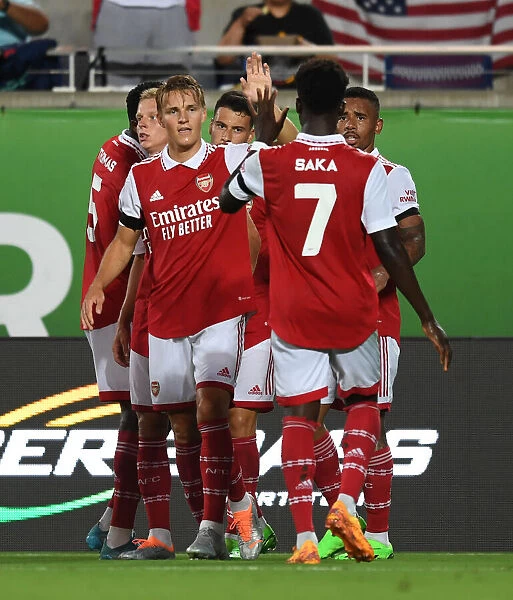 Arsenal Celebrates First Goal Against Chelsea in Florida Cup 2022-23: Martin Odegaard and Bukayo Saka Rejoice after Gabriel Jesus Score