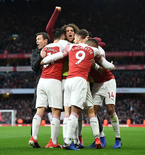 Arsenal Celebrates Three Goals Against Tottenham in Premier League Clash