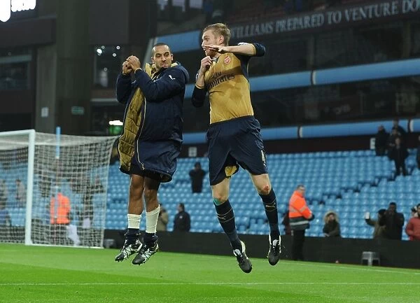 Arsenal Celebrates Premier League Victory Over Aston Villa (2015-16): Theo Walcott and Per Mertesacker Rejoice