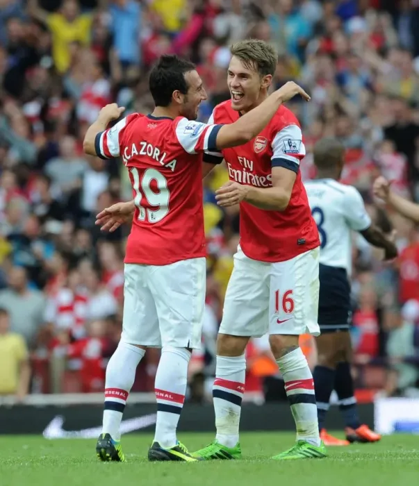 Framed Print : Arsenal Celebration: Ramsey and Cazorla Rejoice in Derby Victory over Tottenham, 2013-14 Framed Print : Arsenal Celebration: Ramsey and Cazorla Rejoice in Derby Victory over Tottenham, 2013-14