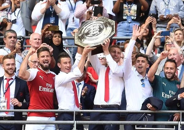 Arsenal Champions: Koscielny, Mertesacker, Chambers, Giroud, Gabriel, and Ospina Lift the FA Community Shield