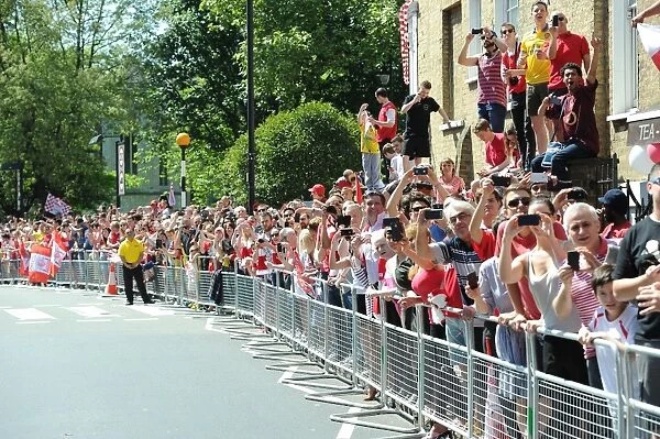 Arsenal Champions Parade: Triumphant Celebration through Islington, May 18, 2014