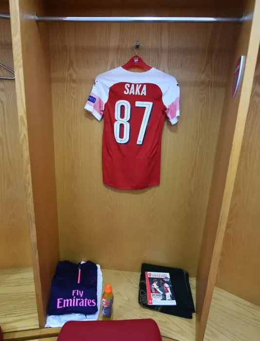 Framed Print : Arsenal Changing Room: Buyako Sakas Europa League Shirt Prepared for Qarabag Clash