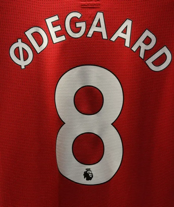 Framed Print : Arsenal Changing Room: Martin Odegaard's Shirt Before Arsenal vs Burnley (2021-22)